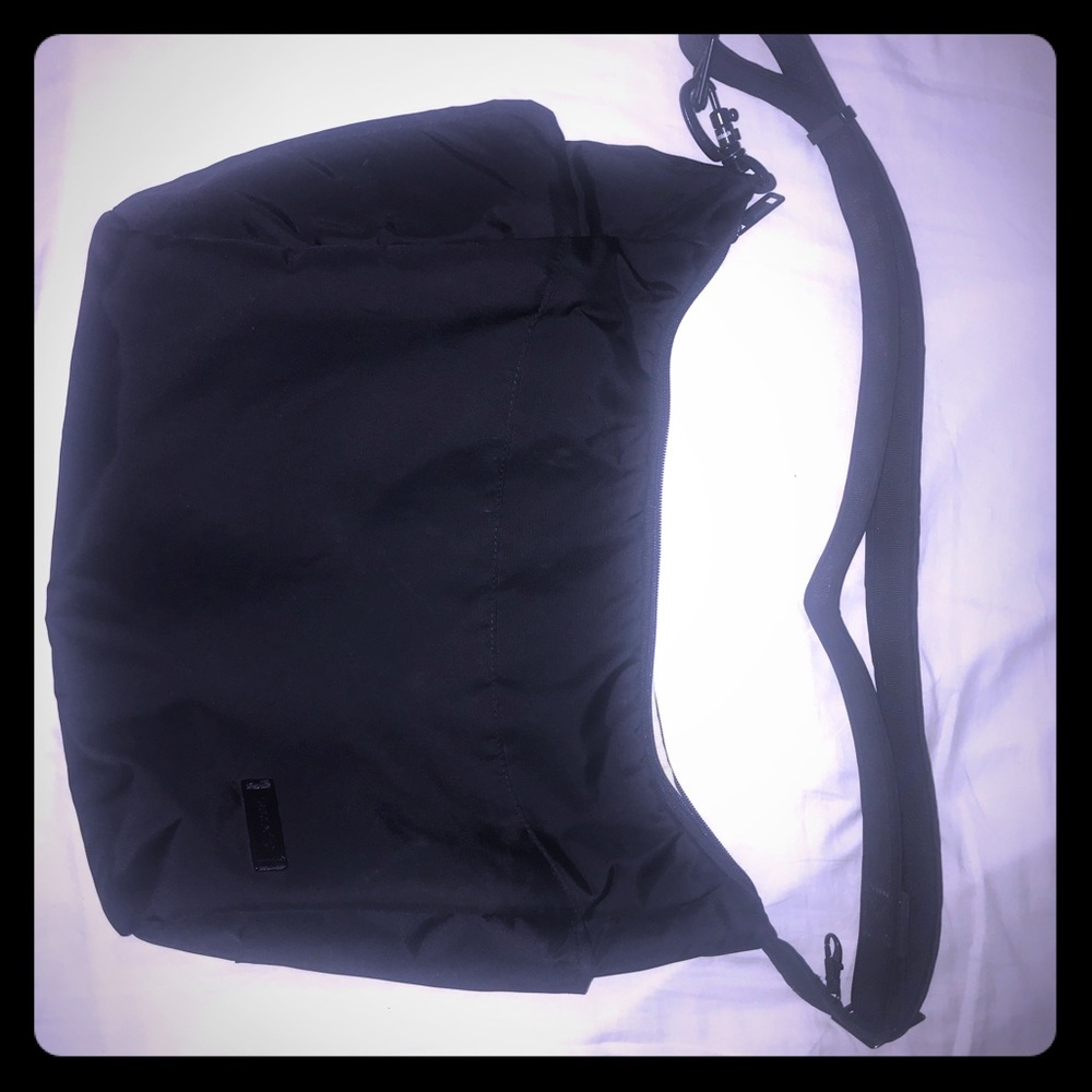 Pacsafe cross body bag. Black